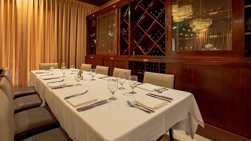 Private dining room with table set for ten
