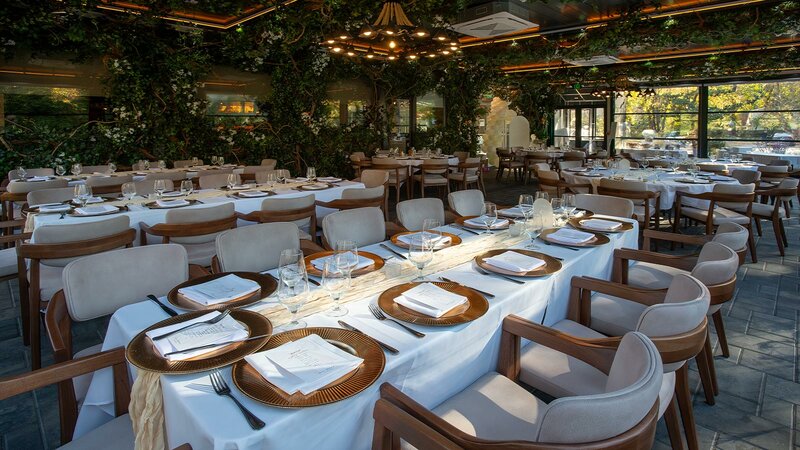 Garden room with long rectangular tables with white table cloths - Sear House - Gallery Photo 2 Garden room with long rectangular tables with white table cloths