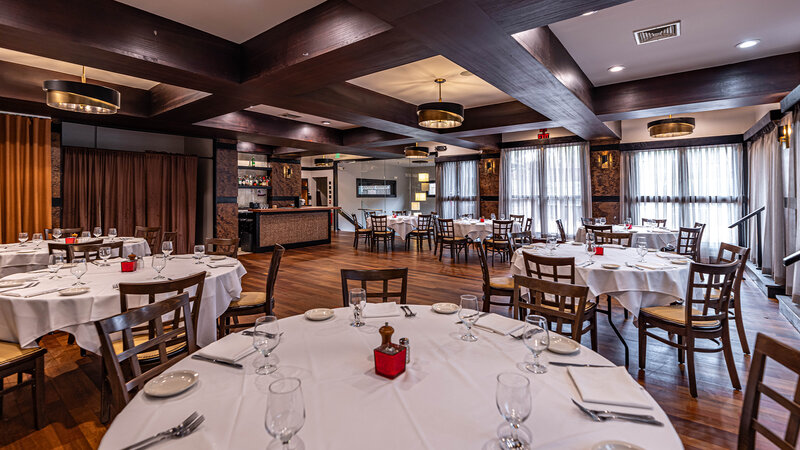 Onyx Room with focus on round set table - Sear House - Gallery Photo 1 Onyx Room with focus on round set table